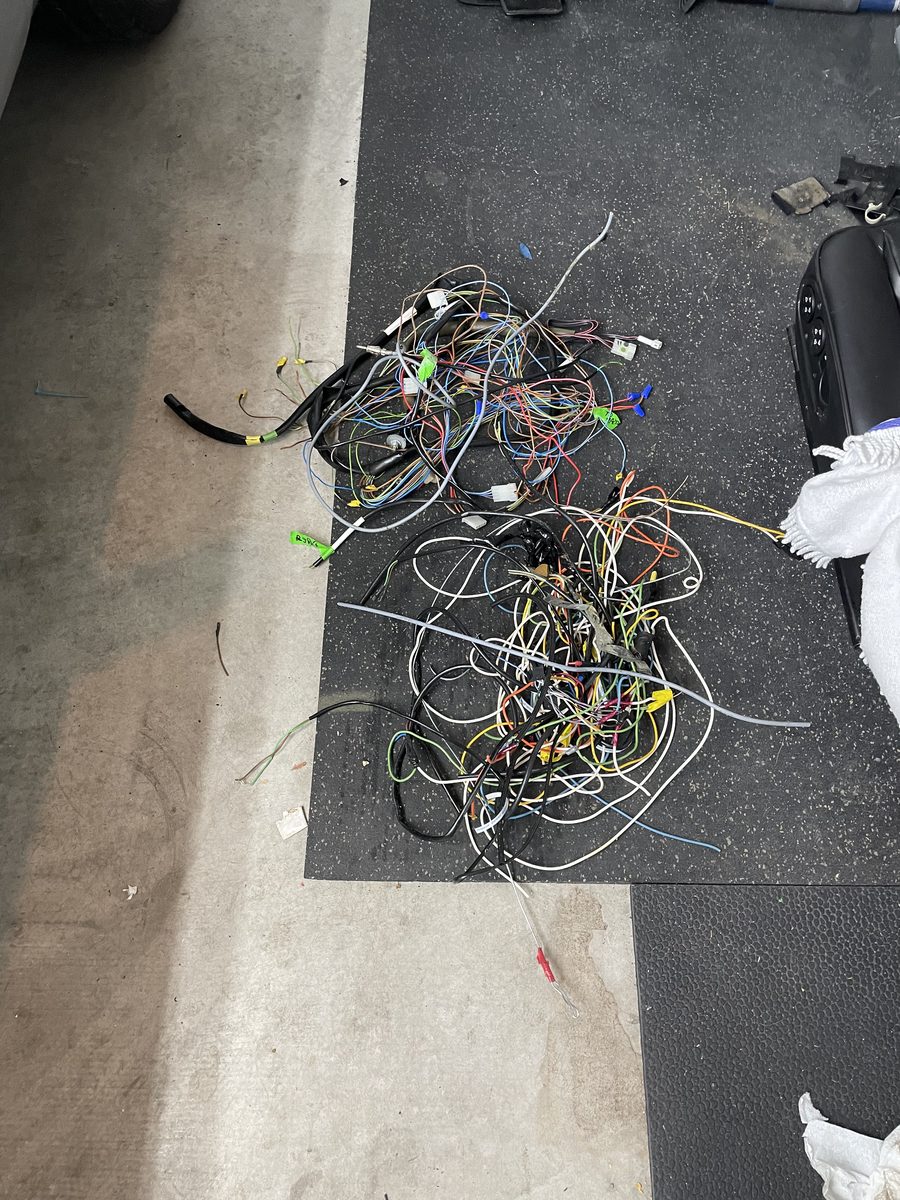 Porsche 928 interior wiring harness removed and laid out, showing roughly 180 feet of wiring reduced